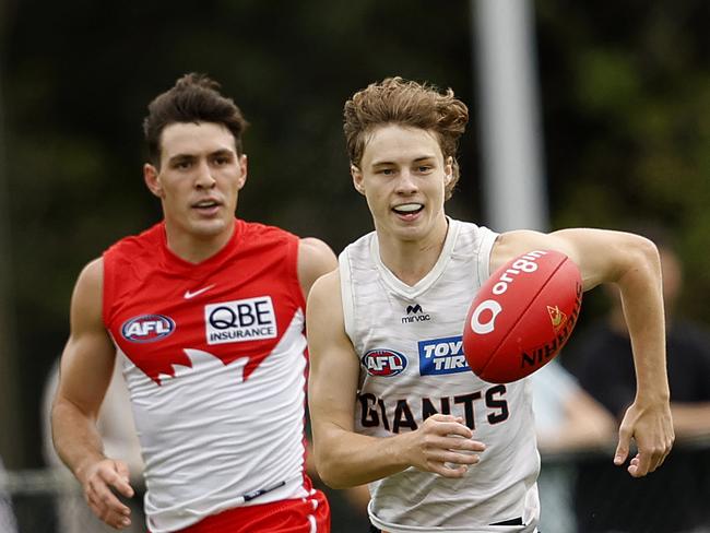 Giants Cody Angove and Sydney's Errol Gulden during the AFL practice match between the Sydney Swans and GWS Giants at Tramway Oval on February 21, 2025. Photo by Phil Hillyard (Image Supplied for Editorial Use only - **NO ON SALES** - Â©Phil Hillyard )