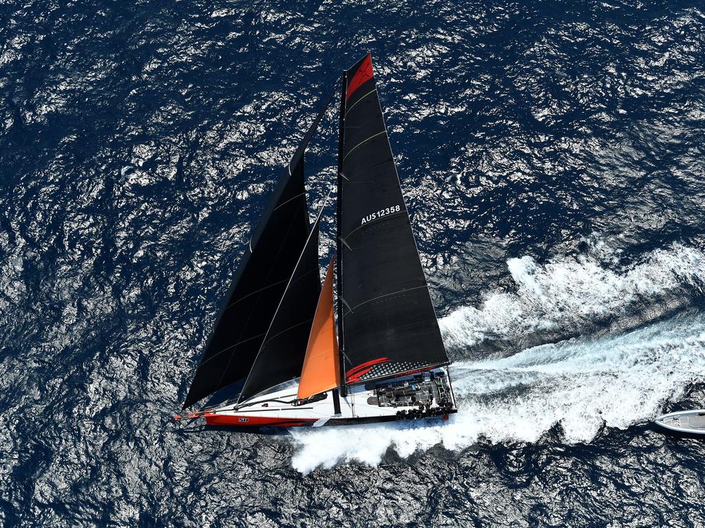 Comanche took the lead over Info Track as the field makes its way down the coast following the start of the Sydney to Hobart Yacht race in Sydney, Thursday, December 26, 2019. (AAP Image/Dean Lewins)