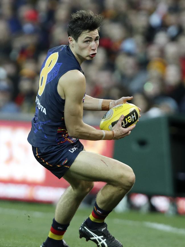 Jake Kelly looks for an option against GWS. Picture: Sarah Reed