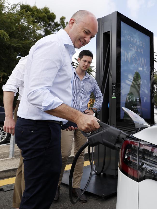 Treasurer and Minister for Energy Matt Kean plugging in his electric vehicle at the Park &amp; Ride car park in Narrabeen. Picture: Jonathan Ng