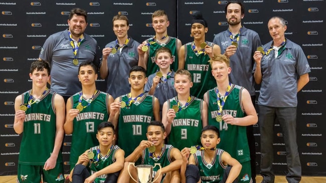 Hills Hornets players after winning their overtime grand final.