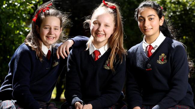 Girls’ talk: Our Lady of the Sacred Heart College students Jaimee, Elyse and Laj. Picture: Calum Robertsonn