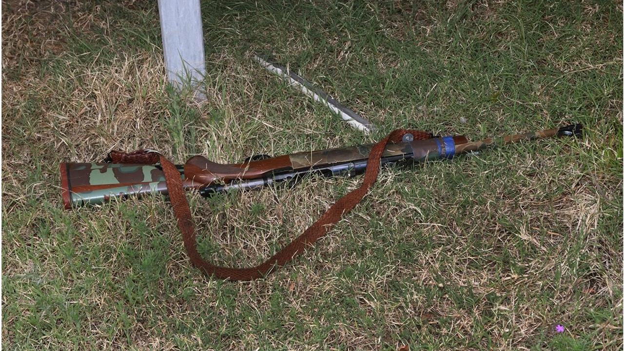 A rifle found on the ground at the Train property.