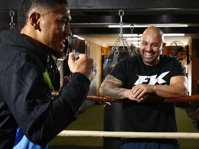 Fidel Tukel, (former boss of the Comanchero) and Paulo Aokuso. Fidel left the Comanchero to start a new life through his knowledge of boxing and is currently training Paulo ahead of his next fight. Picture: Richard Dobson