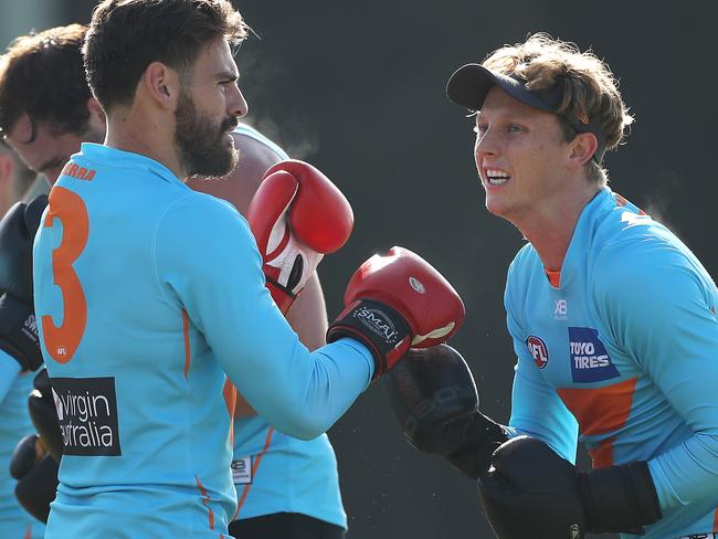 SYDNEY, AUSTRALIA - JUNE 09: Lachie Whitfield boxes during a Greater Western Sydney Giants AFL Training Session at GIANTS Stadium on June 09, 2020 in Sydney, Australia. (Photo by Mark Kolbe/Getty Images)