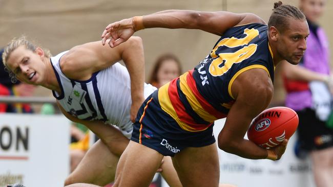 Cam Ellis-Yolmen gets away from Fremantle’s Nat Fyfe. Picture: David Mariuz/AAP