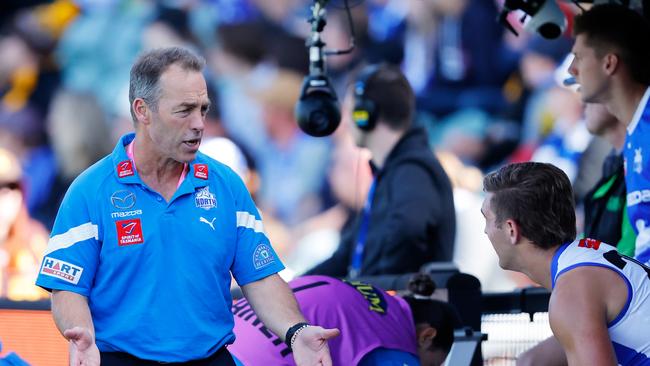 Alastair Clarkson talks to his players during the Roos loss. Picture: Getty Images