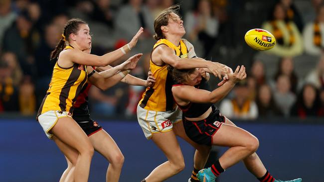 Paige Scott of the Bombers and Eliza Shannon of the Hawks in action during the 2022 S7 AFLW Round 01 match. (Photo by Michael Willson/AFL Photos via Getty Images)