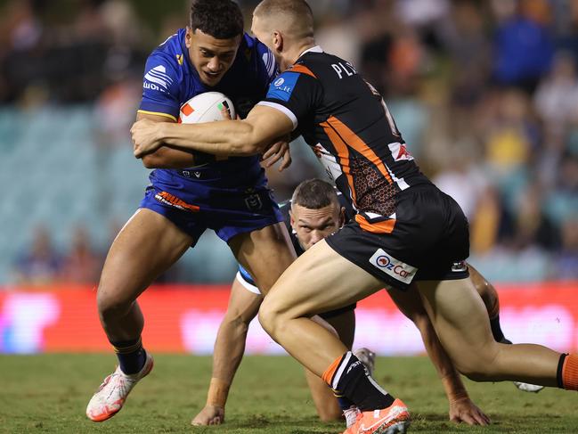 SYDNEY, AUSTRALIA - FEBRUARY 21:  Isaiah Iongi of the Eels is tackled during the 2025 NRL Pre-Season Challenge match between Wests Tigers and Parramatta Eels at Leichhardt Oval on February 21, 2025 in Sydney, Australia. (Photo by Mark Metcalfe/Getty Images)