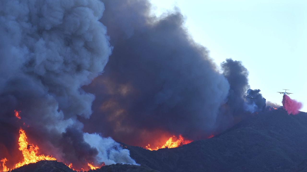 The Palisades Fire — first reported in the Topanga State Park area of LA Tuesday morning — has taken over nearly 20,000 acres in the Pacific Palisades. (Picture: Mario Tama/Getty Images)