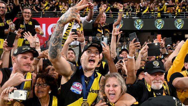 Dustin Martin soaks up the adulation of Richmond supporters.