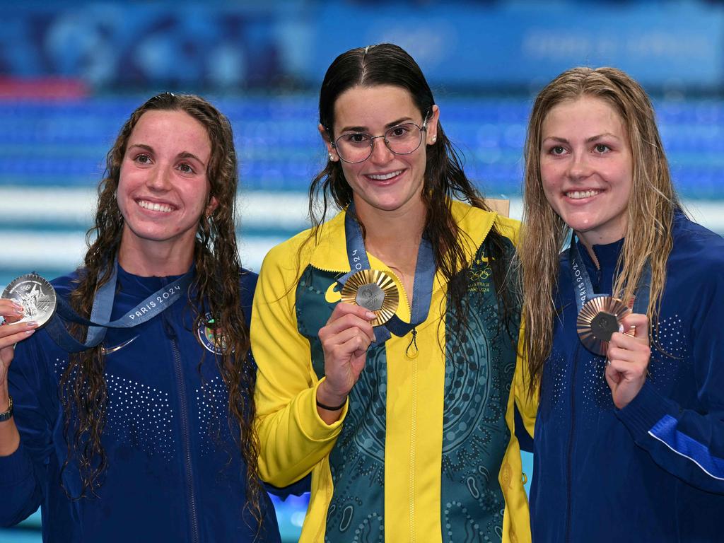 Silver medallist USA’s Regan Smith, gold medallist Australia's Kaylee McKeown, centre and bronze medallist USA’s Katharine Berkoff. Picture: Jonathan Nackstrand/AFP