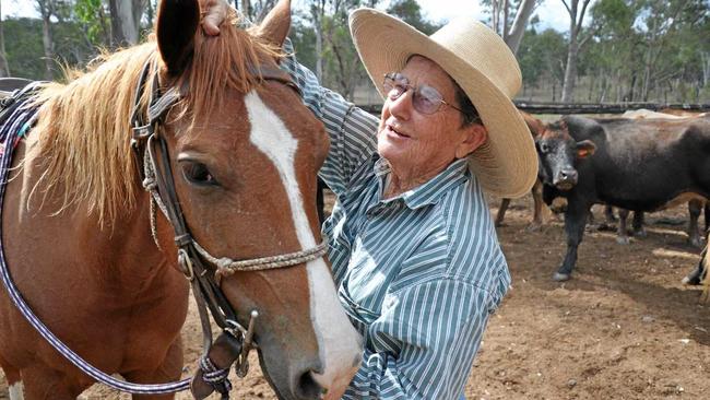 Girlie and her beloved work horse Joey. Picture: Mackenzie Colahan