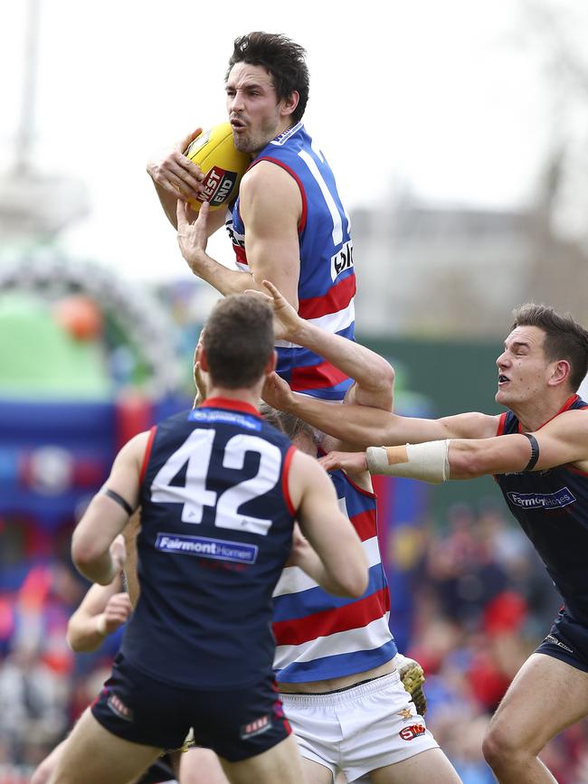 John Butcher takes a high-flying mark for Cental District against Norwood. Picture: Sarah Reed