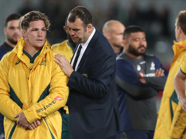 Cheika comforts Wallabies skipper Michael Hooper after the loss. Picture: AAP