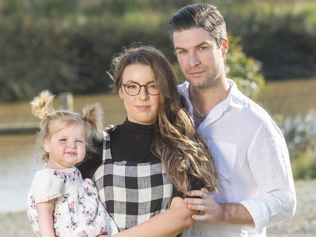 Aley, Isla and Aaron Fisher. She fears she will be paying her $1000 BNPL debt for the next two years. The 24-year-old mother, from Melbourne, lost her job recently. Picture: Rob Leeson.