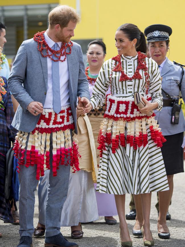 Harry and Meghan wore traditional Tongan outfits, wrapped around their waists. Picture: AP