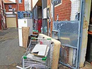 Dumping in Eggins Lane in the middle of the Lismore CBD is commonplace. Image 2 (below): The sign Council will begin placing in public areas where people are dumping to advise them fines apply. Picture: Lismore City Council