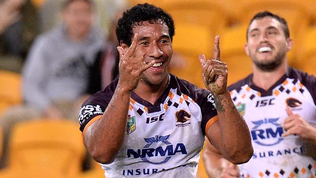 BRISBANE, AUSTRALIA — MAY 19: Tautau Moga of the Broncos celebrates scoring a try during the round 11 NRL match between the Brisbane Broncos and the Wests Tigers at Suncorp Stadium on May 19, 2017 in Brisbane, Australia (Photo by Bradley Kanaris/Getty Images)