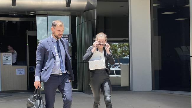 Amber Taylor Priestley (right) leaving the Southport courthouse with her lawyer Jason Grant. Picture: Jessica Paul