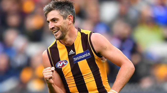 MELBOURNE, AUSTRALIA - MARCH 31: Ricky Henderson of the Hawks celebrates kicking a goal during the round two AFL match between the Hawthorn hawks and the Western Bulldogs at Melbourne Cricket Ground on March 31, 2019 in Melbourne, Australia. (Photo by Quinn Rooney/Getty Images)