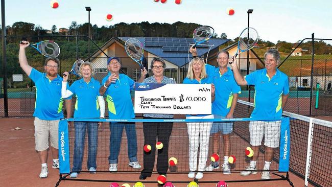 CELEBRATION: Dion Andrews, Joan Nicoll, Graham Nicoll , Vesna O'Connor, Debbie Teitzel, Geoff Dowling and Rob Nienhuis are all smiles about the future of the Tennis Terranora Club. Picture: Richard Manando