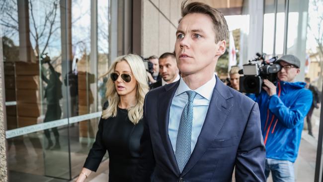 Roxy Jacenko and Oliver Curtis arrive at NSW Supreme Court for sentencing following his insider trading conviction. Picture: Craig Greenhill