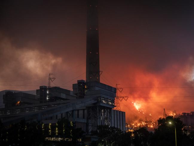 MUGLA, TURKEY - AUGUST 04: Fires burn at the back of the Kemerkoy Thermal Power Plant on August 04, 2021 in Mugla, Turkey. Large wildfires continue to burn across Turkey's southern coast for the seventh day. The death toll from the fires currently stands at eight according to Turkey's Health Ministry.  (Photo by Chris McGrath/Getty Images)