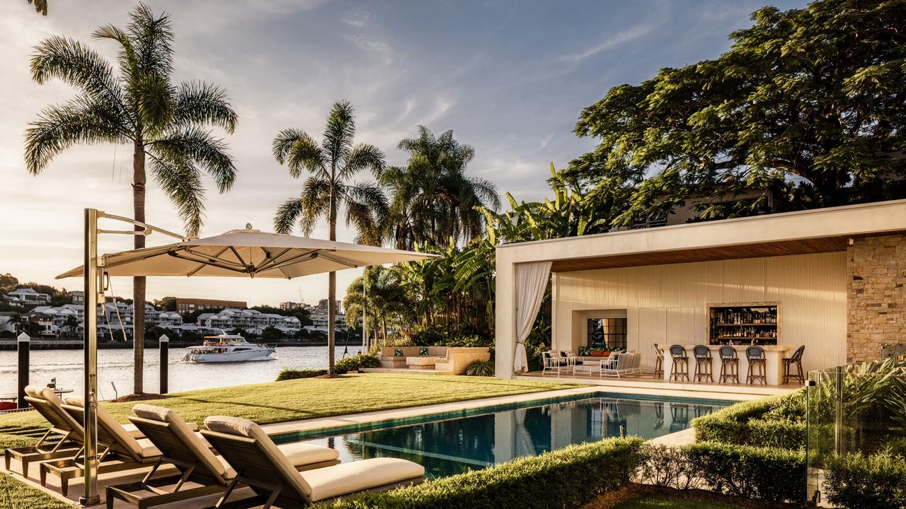 The property comes with a resort-style pool and bar overlooking the Brisbane River.