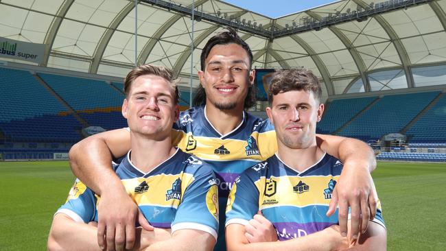 Titans unveiling big new brand refresh to coincide with launch of club's new 10-year plan. AJ Brimson, Tino Fa'asuamaleaui and Toby Sexton modelling new jerseys at CBUS Stadium. Picture Glenn Hampson