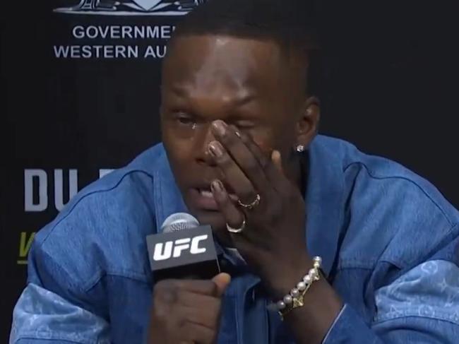 Adesanya wiped the tears out of his eyes. Photo: Fox Sports