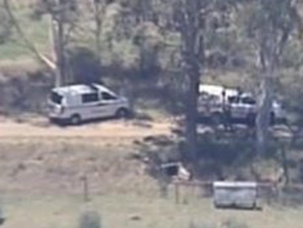 Gunman flees police to bushland