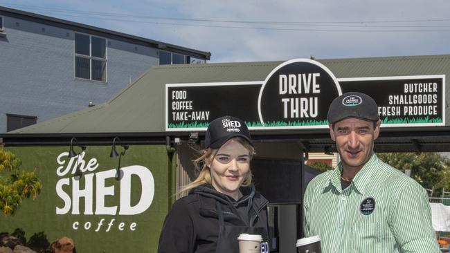 COFFEE TO GO: Opening new business The Shed Coffee Drive Thru on Monday are barista Kate Armstrong and owner Ted Ellison. Picture: Nev Madsen.