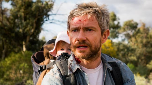 Martin Freeman with baby Rosie in a scene from Australian film Cargo