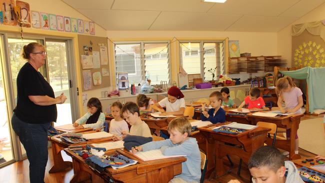 rbh Teacher Lisa with the composite years 1 and 2 class at Birali Steiner School at Beachmere. PICTURE: ALAN QUINNEY