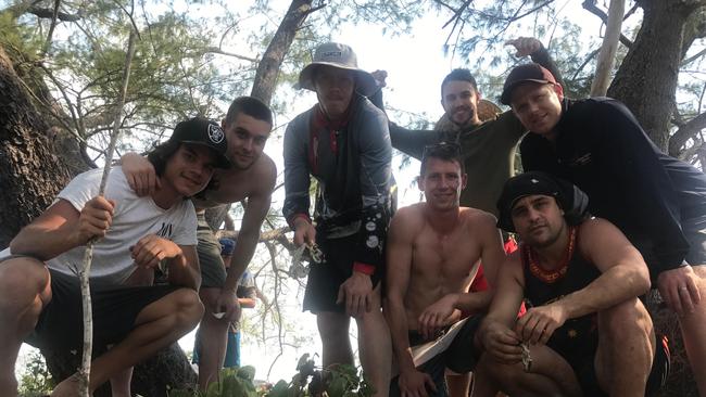 Richmond player Daniel Rioli, left, and teammates including Jack Riewoldt, Dylan Grimes and Shane Edwards when he took them back to the Tiwi Islands