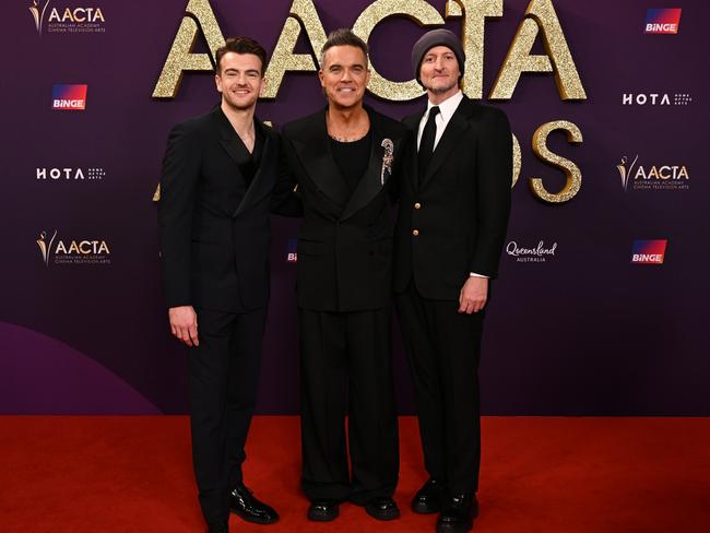 Jonno Davies, Robbie Williams and Michael Gracey at the 2025 AACTA Awards. Picture: Dan Peled/Getty Images