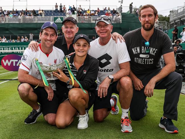 Ash Barty said she was looking forward to a few beers with her team, which includes boyfriend Gary Kissick (far left) and coach Craig Tyzzer (second from right). Picture: Getty