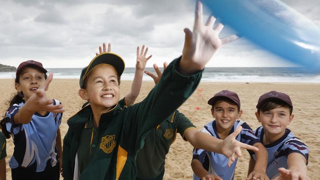  Aria O'Shea, 11, from Cronulla Public School, playing Ultimate Frisbee, with kids from Brighton Le Sands Public School at Maroubra Beach. Picture: Quentin Jones