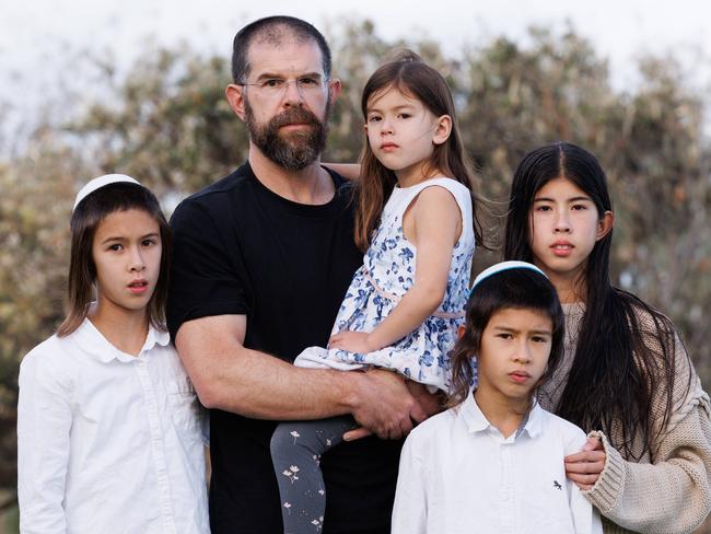 DAILY TELEGRAPH NOVEMBER 13, 2023Marc Rosenthal and his four children Gali, 11, Amichai 10, Aviel, 8 and Nili, 4 at Bondi Beach talking about fears that the Jewish community have living in Sydney with what is happening in Gaza. Picture: David Swift.