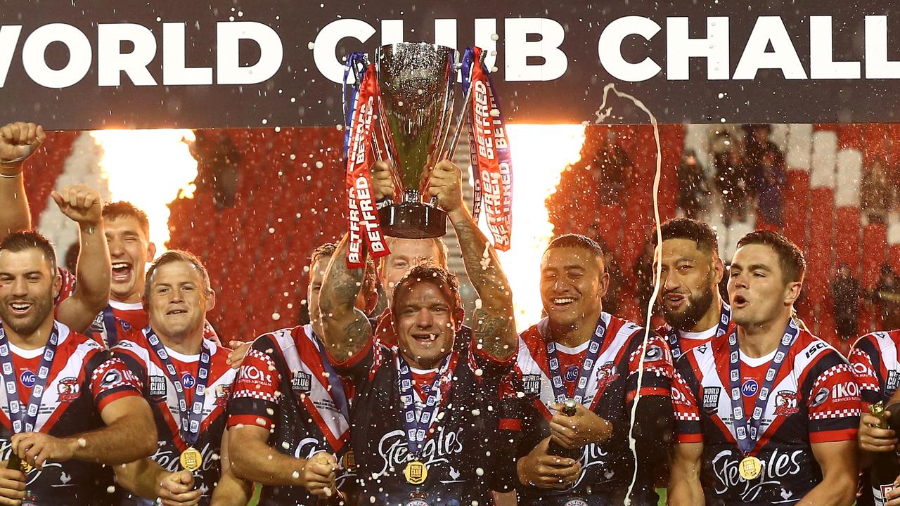 Jake Friend of Sydney Roosters lifts the Trophy after victory in the World Club Series Final win over St Helens.