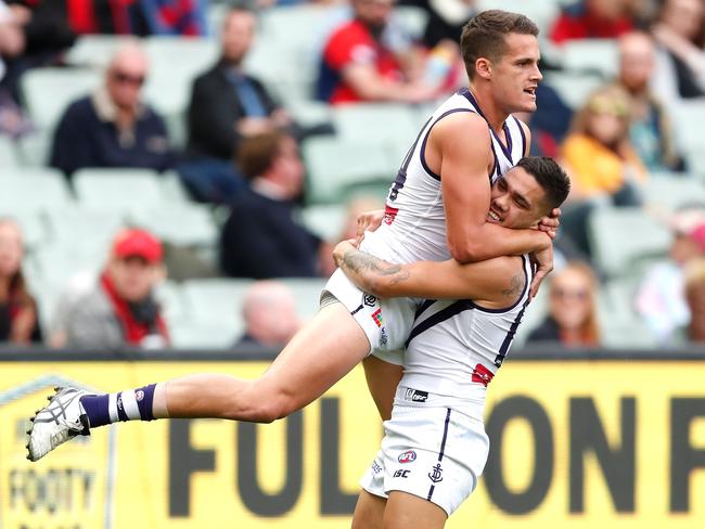 Harley Balic celebrates his first AFL goal with Michael Walters in 2017. Picture: Getty Images