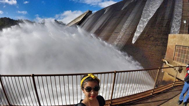 Windy weather tips water over Tinaroo Dam spillway for first time in ...