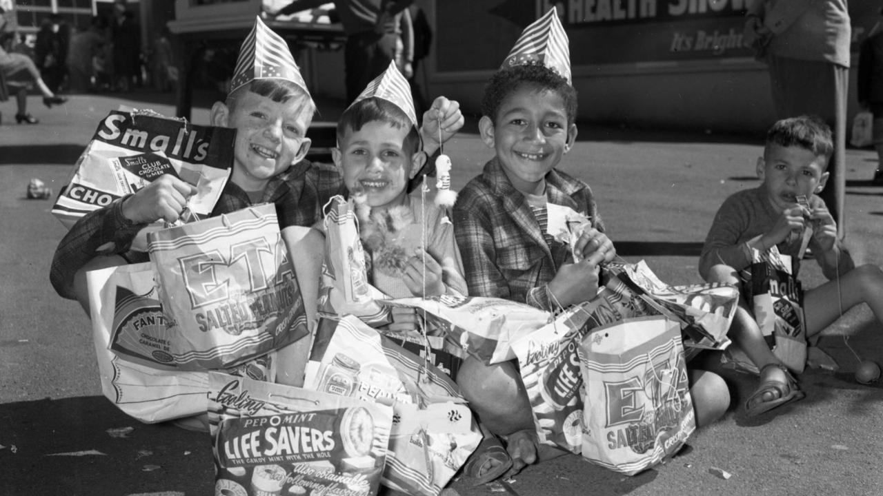 A group of boys with their haul in 1956, when showbags were still great value. Picture: Ray Saunders