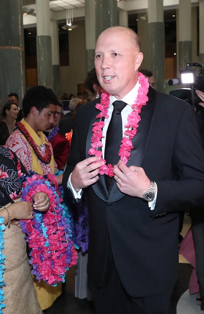 Peter Dutton in a black-tie suit and floral necklace. Picture: Gary Ramage