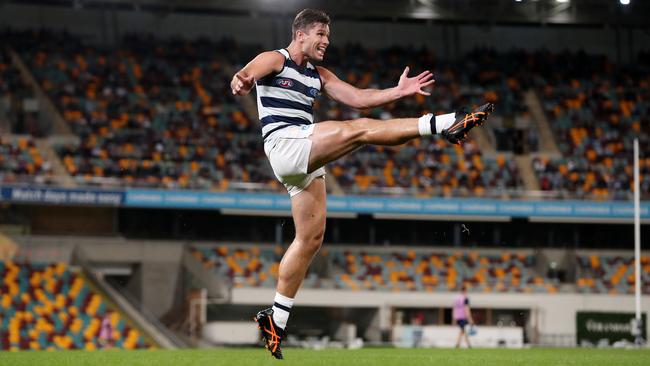 Geelong’s Tom Hawkins kicks at goal against North Melbourne at the Gabba in Round 10. Picture: Michael Klein