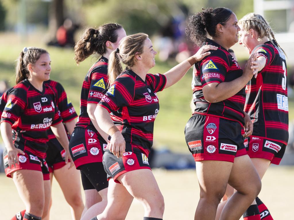 Valleys players celebrate a Chontelle Orcher (second from right) try for Valleys against Newtown.