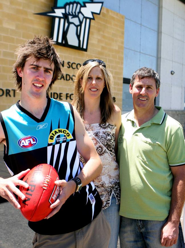 Footballer Matthew Westhoff, who was drafted by Port Adelaide Power, with parents Danny and Robyn at Alberton Oval.