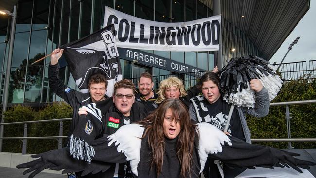 Voula (centre) and members of the Collingwood cheer squad. Picture: Jason Edwards