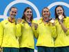 TOKYO, JAPAN - JULY 25: (L-R) Bronte Campbell, Meg Harris, Emma Mckeon and Cate Campbell of Team Australia pose after winning the gold medal in the Women's 4 x 100m Freestyle Relay Final on day two of the Tokyo 2020 Olympic Games at Tokyo Aquatics Centre on July 25, 2021 in Tokyo, Japan. (Photo by Clive Rose/Getty Images)